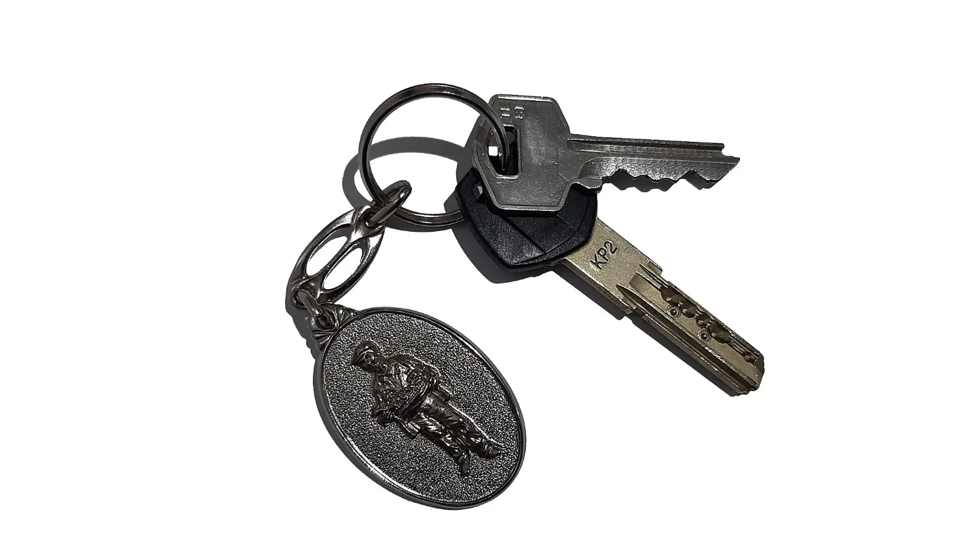 Porte-clés avec deux clés de logement, dont une de porte blindée